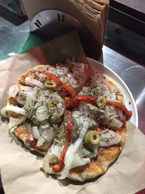 Vegan pizza  at La Cordobesita in Tulum