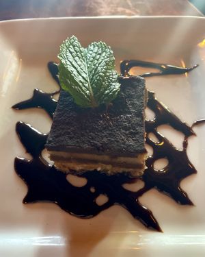 Cutest little vegan cake slice (tiramisu was the day’s flavor). Yummy 💚  at Aster Cafe in Minneapolis