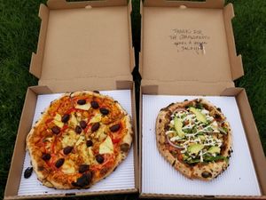 Bonus pizza for leaving a friendly comment to the kitchen at Three Fires Pizza in Fort Wayne