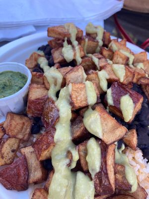 Roasted potatoes with garlic purée  at The Burrito Bar at Breeze Hill in Lansing