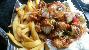 Black bean vegan chicken with rice and chips at Yummy Cottage in Newcastle Upon Tyne
