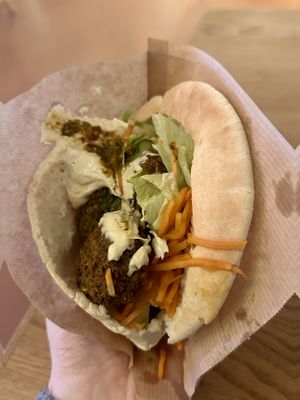 Pita falafel and hummus  at Foodhallen in The Hague