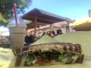 vegan mediterranean panini was delicious! (this is half of it) they also have some vegan gelato flavors as well as smoothies and açaí bowls 😊  at Cafe Dolce in Solvang