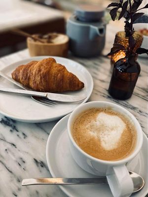 Coffee with almond milk   at Do Largo in Evora