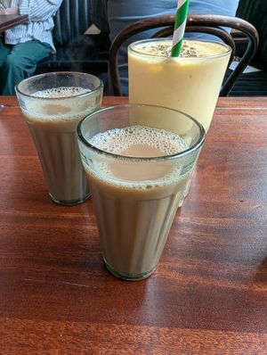 Oat milk chai and vegan mango lassi at Dishoom in East London