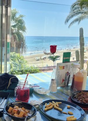 The view sorry no better picture of the food, I forgot at Sunset Bay in Gran Canaria