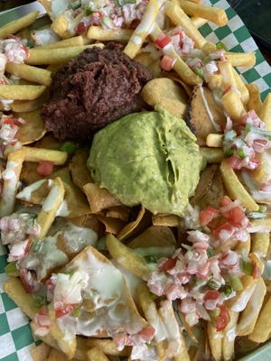 Papi nachos with vegan sauce  at Albedrío in Tegucigalpa