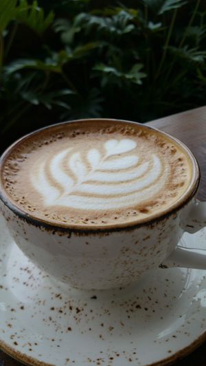 Coffee dreams in a cup at Honest Greens in Lisbon