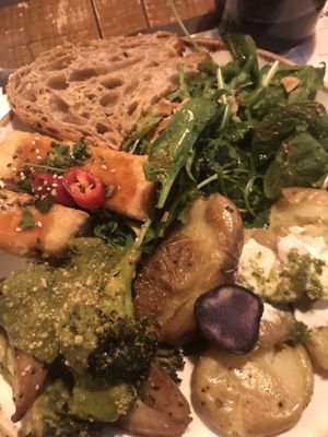 tofu with miso sauce + potatoes with vegan sauce + roasted broccoli & salad  at Honest Greens in Lisbon
