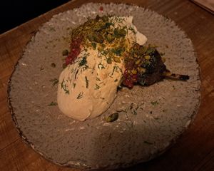 Roasted eggplant with tahini/hummus at Honest Greens in Lisbon