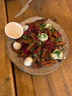 best seller sweet potato fries with vegan truffle mayo on the side (love them) at Honest Greens in Lisbon