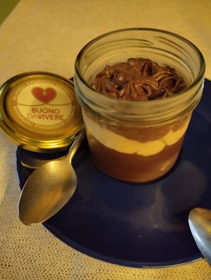 Chocolate based desert with cream and crunchy bits at Libra in Bologna