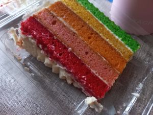 Rainbow cake slice at Coughlans Bakery - West Wickham in West Wickham