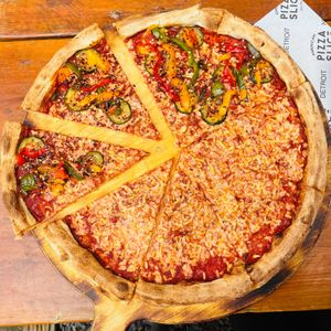 Half Vegan Margherita and Half Vegan Hot at American Pizza Slice in Liverpool