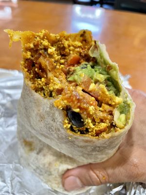 Now that’s what I call a breakfast burrito. Tofu scram, soyrizo, hash brown, black beans, cheese, chipotle sauce, pico, avocado. M  at Nom Eats with Seats in Reno
