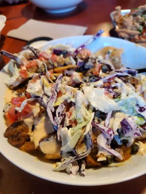 These nachos looked much better before I tore into it. at Nom Eats with Seats in Reno