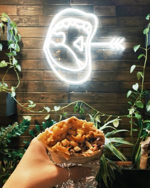 Nom buffalo burrito: soy curls, mac n cheese, coleslaw  at Nom Eats with Seats in Reno