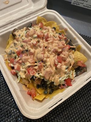 Seitan nachos- homemade chipotle cream sauce and seitan, so good at Nom Eats with Seats in Reno