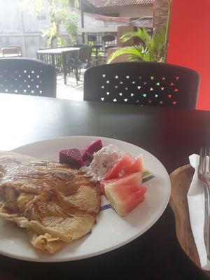 Pancake with fruit and coconut ice cream ♡ at Tasty Vegan in Sanur