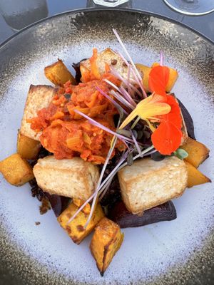 V Tofu mains  at The Views Vegetarian Restaurant in Kaiteriteri