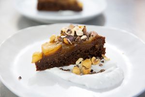 Upside down chocolate and hazelnut pear pudding, coconut whipped cream - GF, V at The Views Vegetarian Restaurant in Kaiteriteri