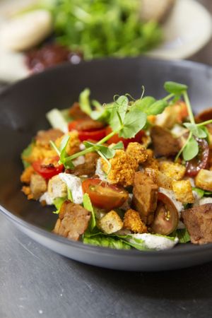 Vegan Caesar salad with tempeh bacon, lentil crumbs, croutons, cos lettuce,
cherry tomato and our chefs Caesar dressing - V at The Views Vegetarian Restaurant in Kaiteriteri