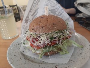 Tempeh burger & homemade lemonade. at Brunette Burger in Plzen