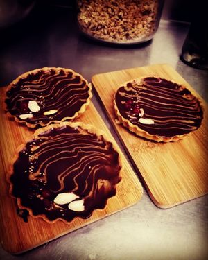 Gluten-free homemade cacao pie, dark chocolate, organic coconut butter and peanut butter. Amazing ❤️ at ClemCafé in Santiago De Compostela