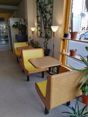Quelques tables pour manger sur place. at Le Dep Frida in Trois-rivieres