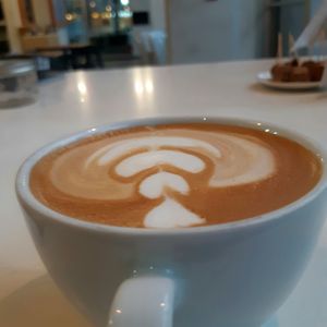 Oat milk coffee at Heirs Pears in Vancouver