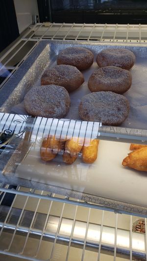 Apricot,  raspberry and ? Below mushroom,  potato or cabbage. at Papillon International Bakery in Glendale