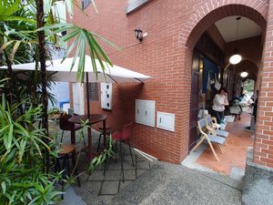 Outdoor seating area (the whole sidewalk until the end of the alley) at Mukuchi 無口小廚 - WúKǒu Xiǎo Chú in Taipei