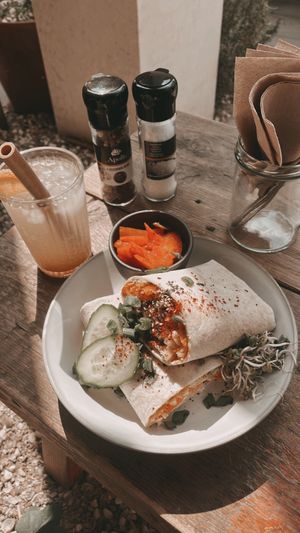Pea wrap with kimchi on the side and ginger lemon   at Jungle Café & Catering in Eindhoven
