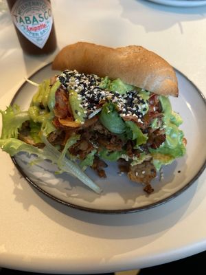 Tempeh sandwich with gluten free bread   at Jungle Café & Catering in Eindhoven