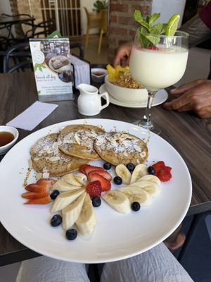 Oatmeal pancakes
with honey, jam, seasonal fruits, chia.  at Cafe Central Traveler's Coffee in Cartagena