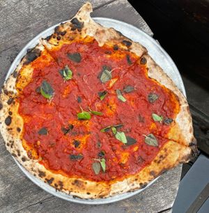 Rustic Tomato Pie: 
slow cooked marinara sauce,  fresh oregano, extra virgin olive oil at Chestnut Hill Brewing Company in Philadelphia