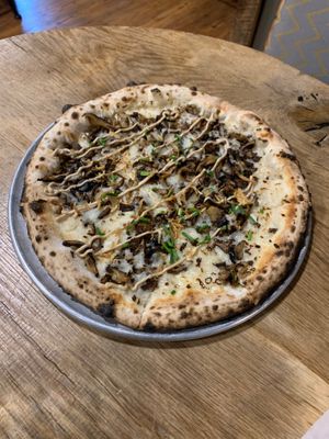 Pizza. This is the mushroom one. My fave is the veggie w vegan cheese  at Chestnut Hill Brewing Company in Philadelphia