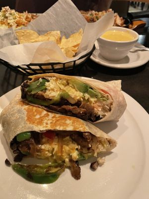 Beyond meat burrito. I dipped it in some vegan cheese sauce (YUM)    at My Cocina Grill in Streamwood