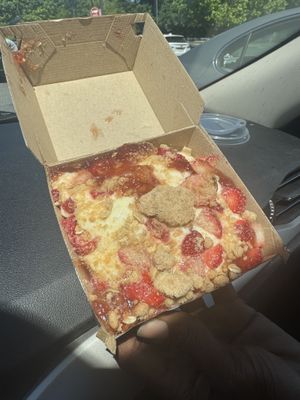 Strawberries and banana cream cinnamon roll   at Cinnaholic in Concord