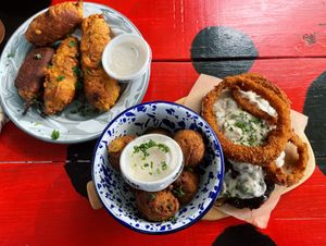 Jalapeño poppers, hush puppies, and seitan steak at Oh My Soul in Charlotte