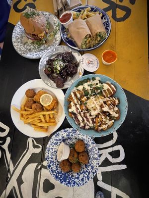 Buddah Bowl with a side of hush puppies, Vicken Wrap, Vish & Chips, Vicken Burger & Wings  at Oh My Soul in Charlotte