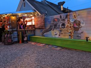 Outdoor bar and dining area  at Oh My Soul in Charlotte