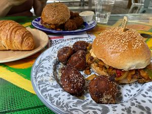 Waka Waka sandwich with pumpkin fritters and a croissant. Delicious! at Oh My Soul in Charlotte