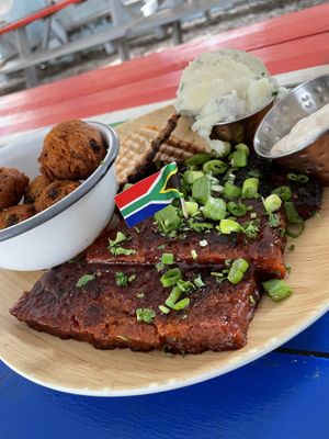 Grilled bbq vibs with cheddar jalapeño hush puppies  at Oh My Soul in Charlotte