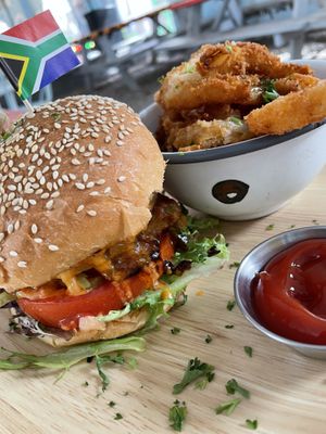 Hippie chick burger with onion rings  at Oh My Soul in Charlotte