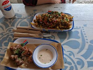 The bang bang shrimp and filthy fries at Oh My Soul in Charlotte