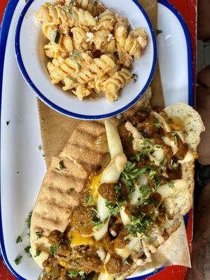 South African 🍔 spicy philly cheesesteak like!   at Oh My Soul in Charlotte