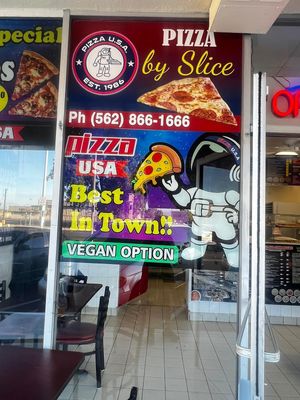 Logo pizza usa at Pizza USA in Bellflower