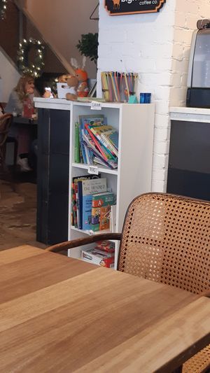 all the books! at bigmoose coffee co in Cardiff