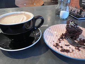 Oat milk mocha and vegan chocolate cake  at bigmoose coffee co in Cardiff